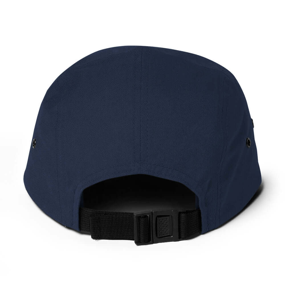 Breck Five Panel Hat back view showing nylon strap clip closure and metal eyelets, Mtns Co official licensed ski resort apparel.