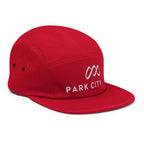 Park City Five Panel Hat from Mtns Co, official licensed ski resort apparel with trail map logo, red camper style cap.
