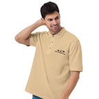 Whistler Blackomb Polo Golf Shirt model wearing beige polo with Mtns Co logo, official licensed ski resort apparel.