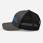 Vail Trucker Hat by Mtns Co, featuring mesh back for airflow and a structured design, perfect for sunny days.