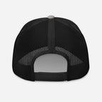 Back view of Keystone Trucker Hat with mesh design, adjustable snap closure, and Mtns Co Trail Map Logo.