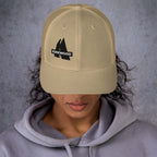 Kirkwood Trucker Hat by Mtns Co, featuring the official licensed ski resort logo for style and adventure.