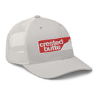 Crested Butte Trucker Hat by Mtns Co featuring a structured design and breathable mesh back for summer adventures.