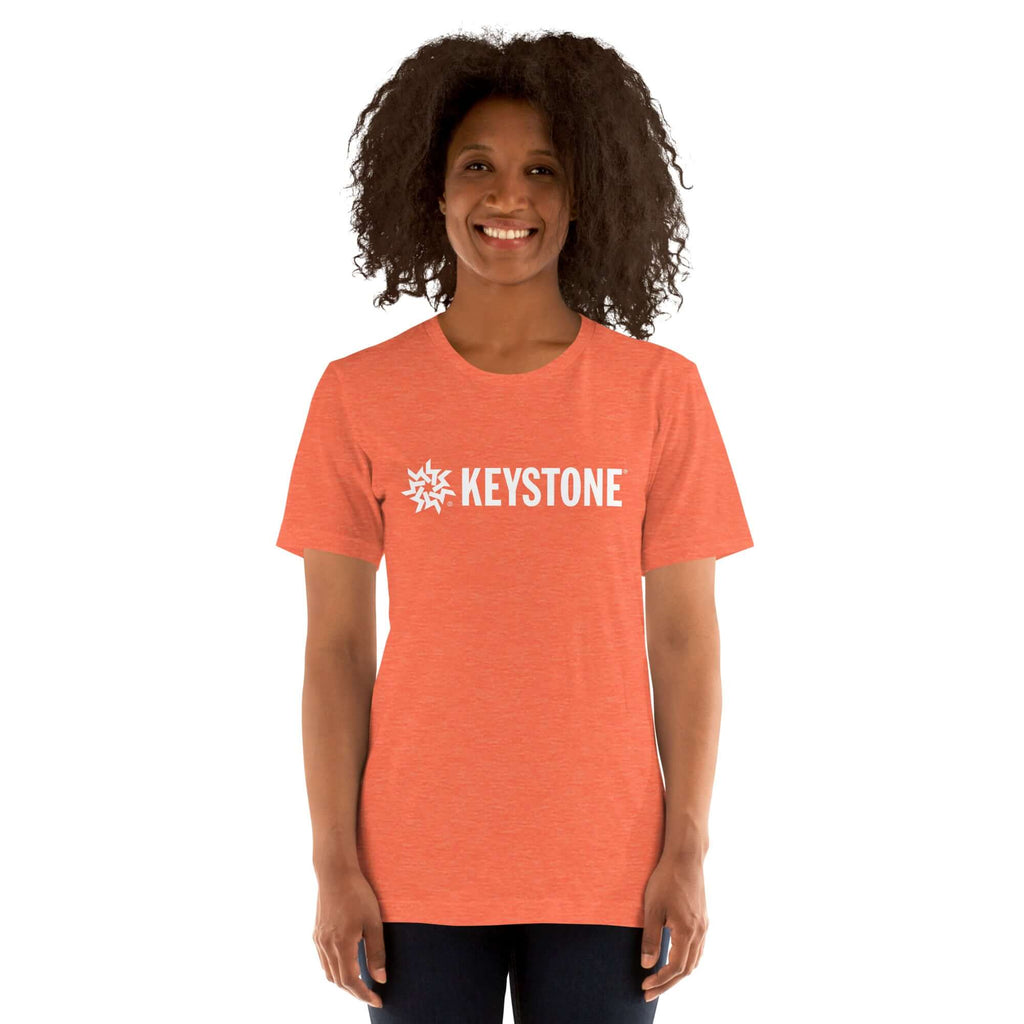Woman wearing a Keystone T-Shirt from Mtns Co, showcasing the official licensed ski resort apparel.