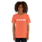 Woman wearing a Keystone T-Shirt from Mtns Co, showcasing the official licensed ski resort apparel.