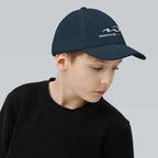 Whistler Blackcomb Youth Baseball Cap featuring Mtns Co Trail Map Logo, perfect for outdoor activities and sun protection.