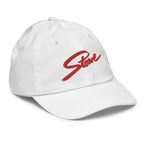 Stowe Youth Baseball Cap by Mtns Co featuring vibrant red logo on a stylish white breathable baseball cap.