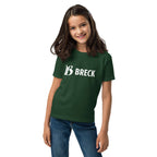 Breckenridge Youth T-Shirt worn by a girl, showcasing Mtns Co Trail Map Logo in a vibrant green color.