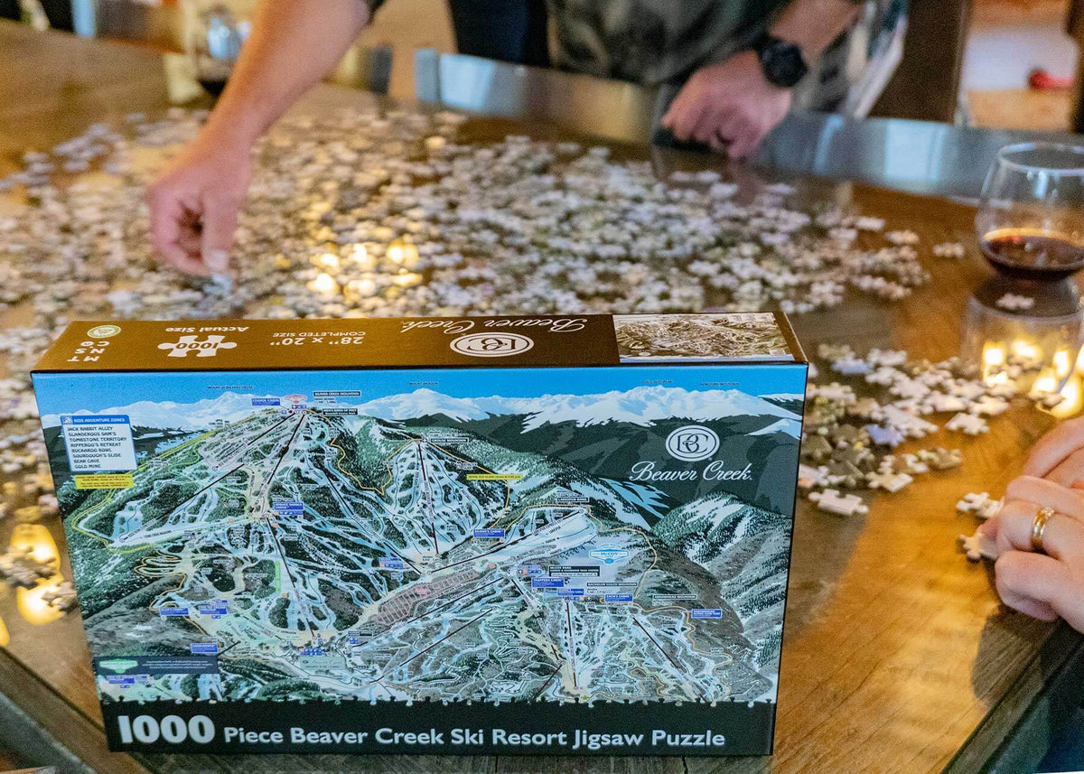 Beaver Creek Ski Resort Jigsaw Puzzle – 1000 Pieces box with pieces scattered on a table, made by Mtns Co.