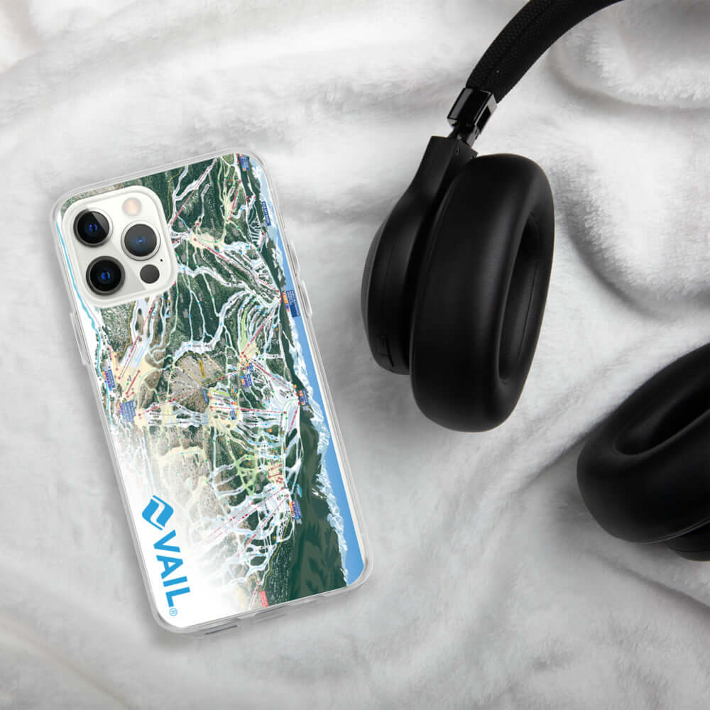 Vail Trail Map iPhone Case by Mtns Co on a soft surface with headphones, showcasing an official licensed ski resort design.